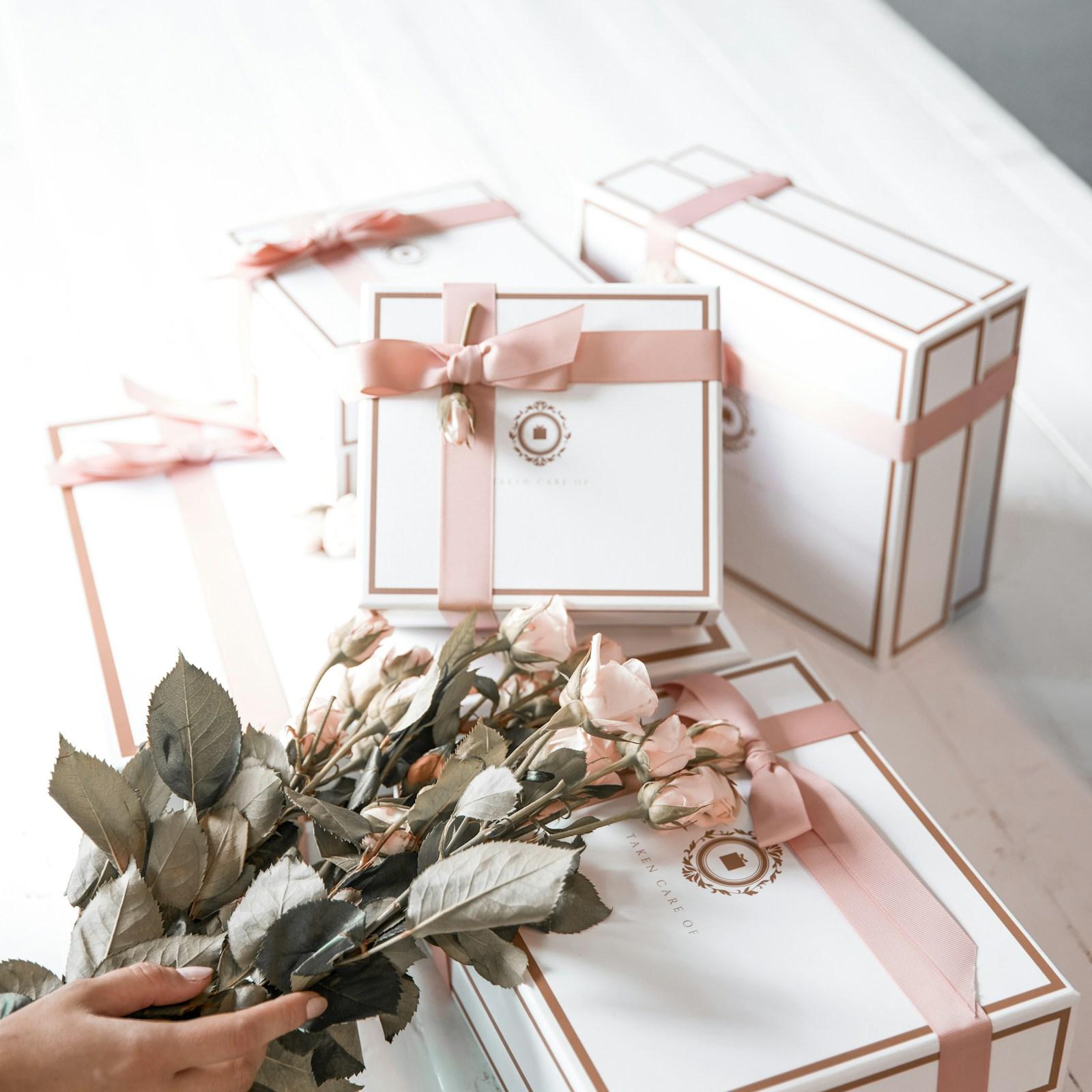 Rigid gift boxes with ribbon and foil — secondary packaging for beauty brands